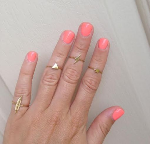 Bright pop of color mani by Essie's "Serial Shopper" which is a color from their 2014 neon line. Gold charm midi rings by: Roc Me Out Online Boutique